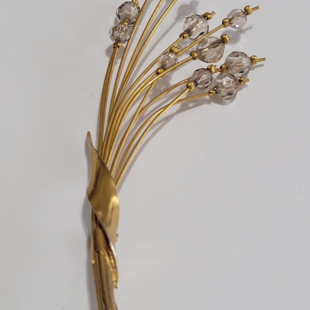 Elegant Gold and Crystal Brooch